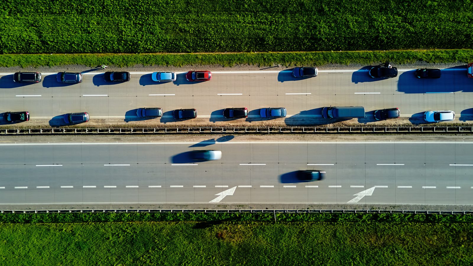 Aerial view of heavy traffic backed up on a highway